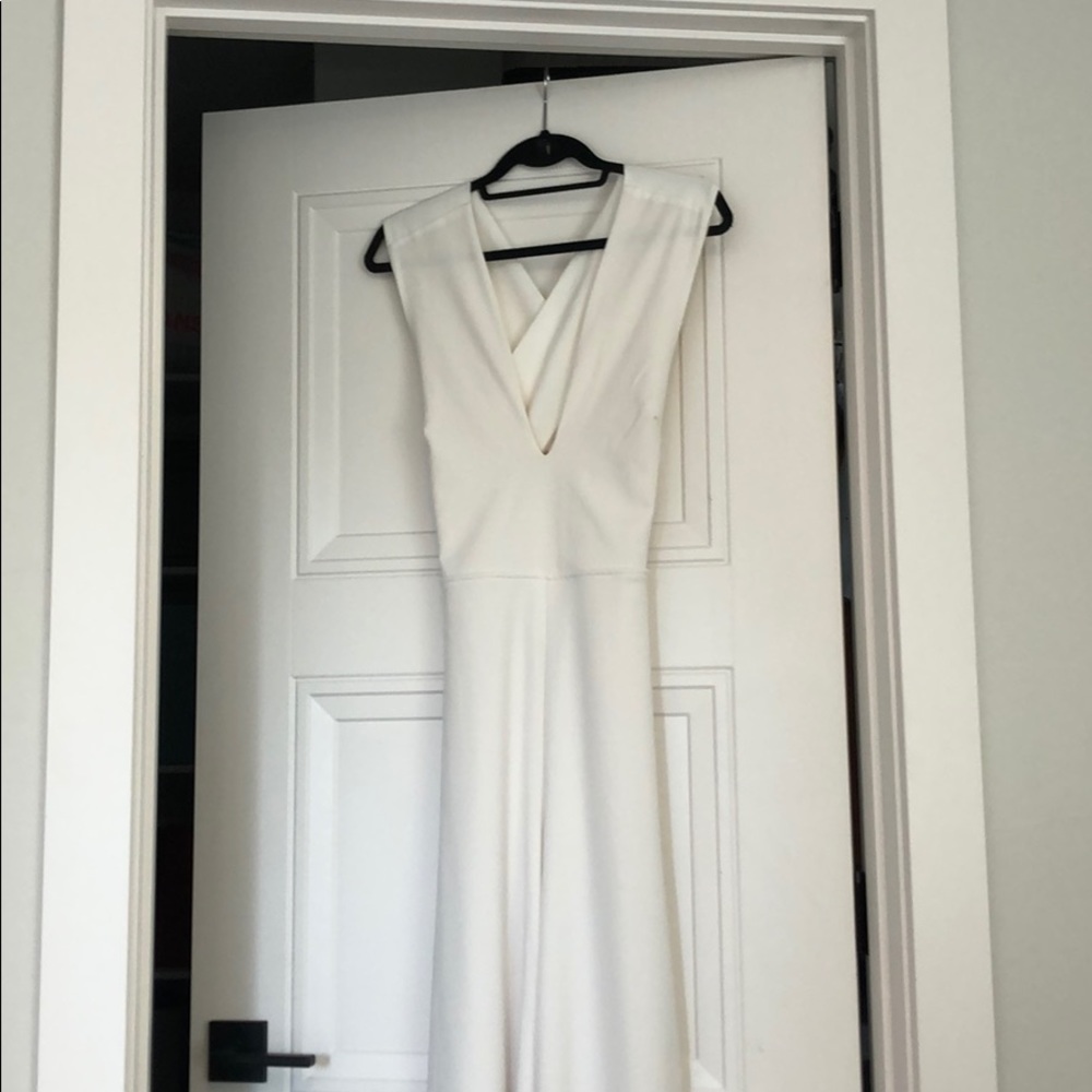 LuLus White Jump Suit/Long romper